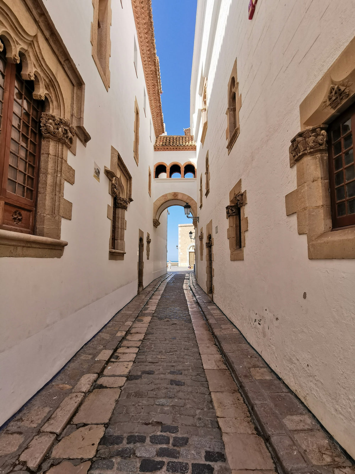 A whitewashed street in Sitges old town